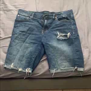 Distressed dark jean shorts